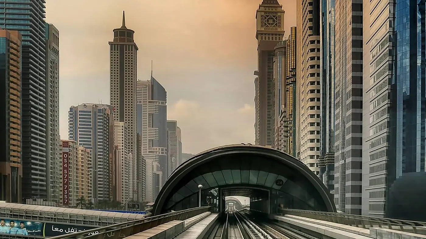 The Metro Station Showing the interior of the station. It's expansive, well-lit spaces are defined by angular, geometric structures and a minimalist aesthetic, creating a sense of order and efficiency